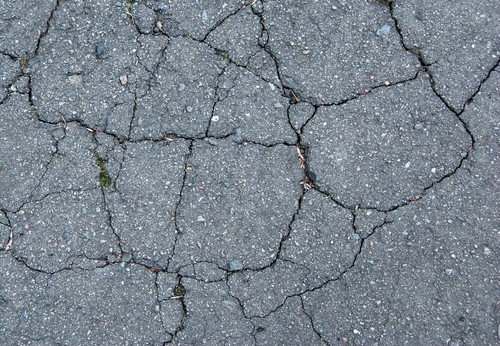 3 Top Causes of Concrete & Asphalt Cracks on Residential Driveway - T
